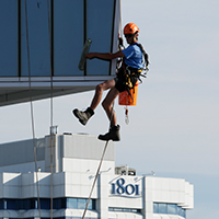 man cleaning the window